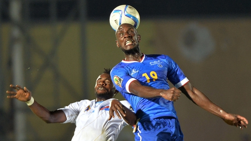 DRC defender Issama Mpeko (left) and Cape Verde forward Julio Tavares contest the ball
