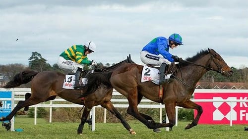 Hurricane Fly and Ruby Walsh go past rival Jezki for an historic win