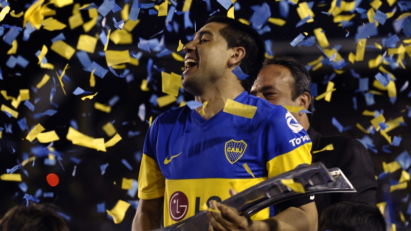 Boca Juniors legend Riquelme hangs up boots at 36
