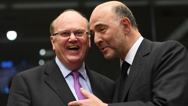 Michael Noonan with European Commissioner for Economic and Financial Affairs Pierre Moscovici in Brussels
