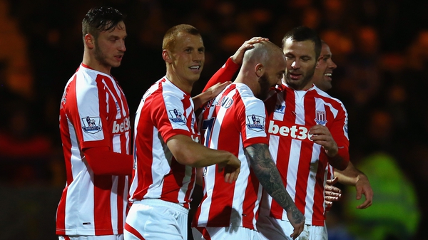 Stephen Ireland of Stoke City celebrates with team mates after scoring their second goal