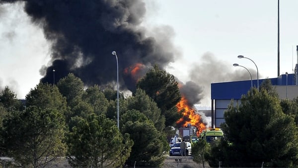 Smoke rises after the Greek F-16 aircraft crashed at Los Llanos air base in Albacete, eastern Spain