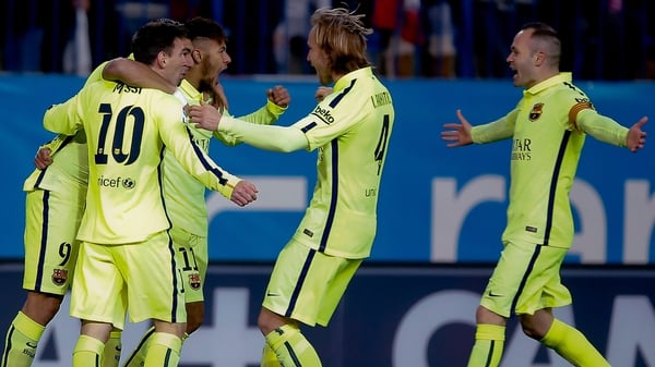 Neymar celebrates scoring Barca's opening goal with his team-mates