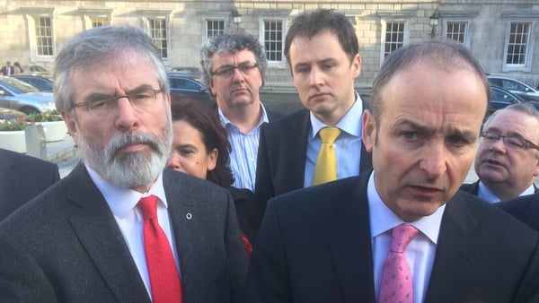 The Opposition spoke outside the Dáil after the walkout