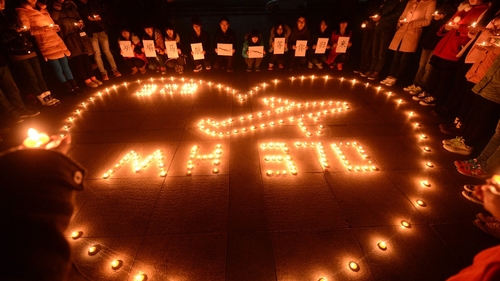 Gaolta na marbh amhrasach faoi 'thimpiste' MH370