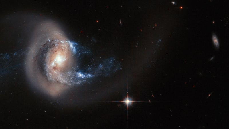 Striking new image reveals distorted spiral galaxy