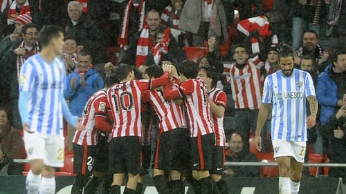 Athletic Bilbao players celebrate after forward Aritz Aduriz scored what proved to be the winner against Malaga