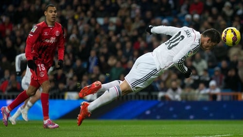 James Rodriguez scored a fine diving header before being forced off injured
