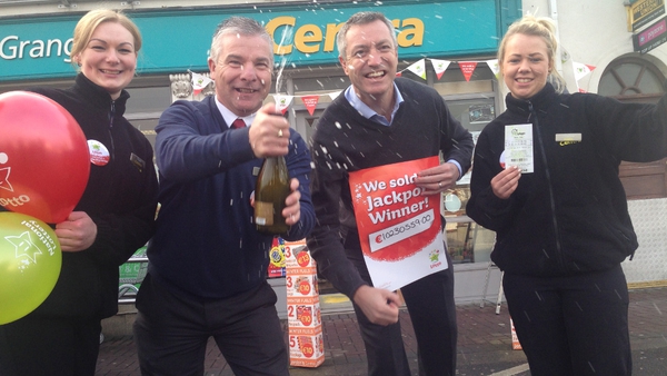 Shop owner Alan Jordan and his staff outside his Centra store in Newbridge which sold the winning €10.2m jackpot ticket