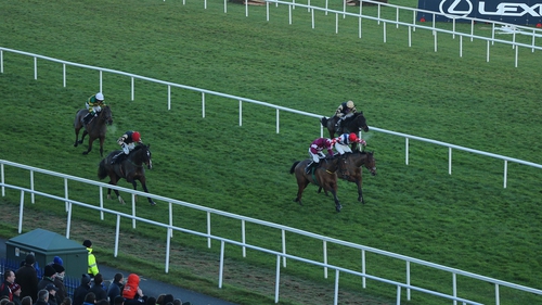 On His Own (red cap), Boson Bob (beige cap) and Carlingford Lough (white cap) all ran in the Lexus Chase at Leopardstown over Christmas
