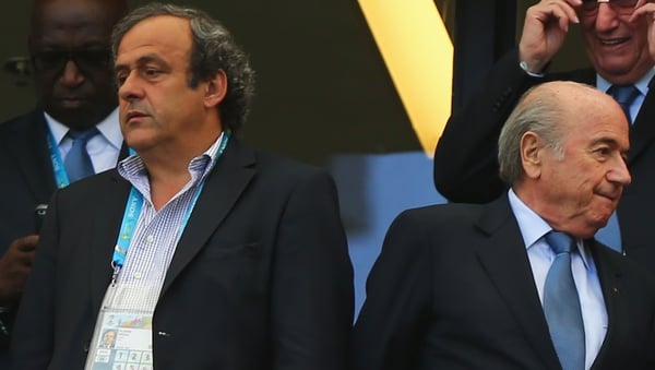 UEFA president Michel Platini (l) and FIFA president Joseph Blatter