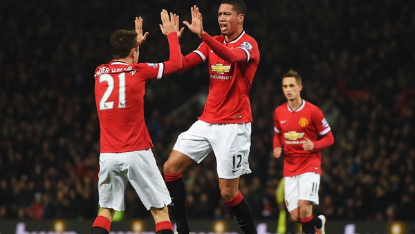 Chris Smalling (c) bagged a brace as Manchester United beat their Lancashire rivals