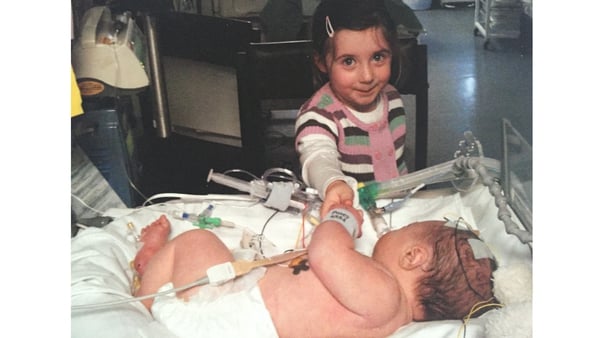 Baby Amber Reilly, seen with her sister Angel, died in February 2010 after suffering oxygen deprivation at birth