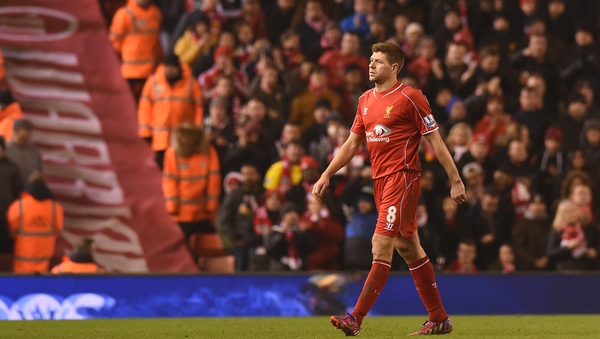 Liverpool skipper Steven Gerrard leaves the field after suffering a hamstring injury