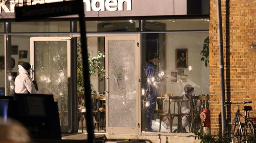 Forensic experts look for clues at the scene of the Copenhagen shooting