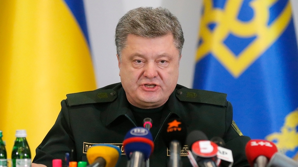 Petro Poroshenko says Ukraine has withdrawn the lion's share of its rocket and heavy artillery systems from the frontline
