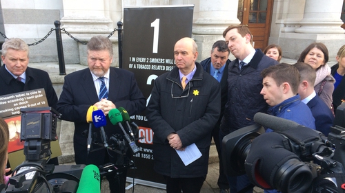 James Reilly (second from left) says Ireland has always been a leader in tobacco control measures