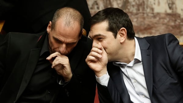 Greek Prime Minister Alexis Tsipras (R) and Finance Minister Yanis Varoufakis in the Athens parliament