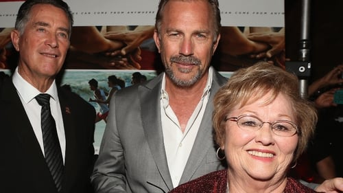 Coach Jim White, actor Kevin Costner and Cheryl White attend a screening of McFarland, USA in Bakersfield, California on Feb. 15.