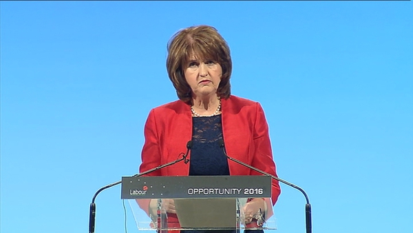 Joan Burton said the Labour Party has risen to the challenge of rescuing the country in a dark and difficult hour