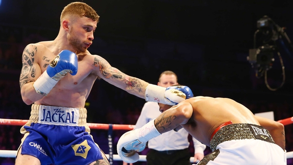 Chris Avalos attempts to evade Carl Frampton at the Odyssey Arena