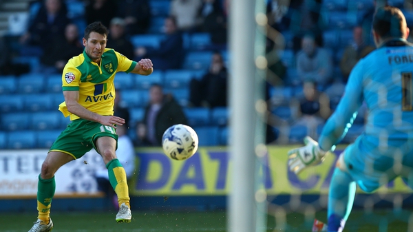 Wes Hoolahan watches his shot power towards the net