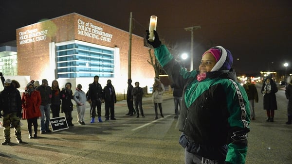 Protests outside the Ferguson Police Department after the Justice Department decided not to charge Darren Wilson