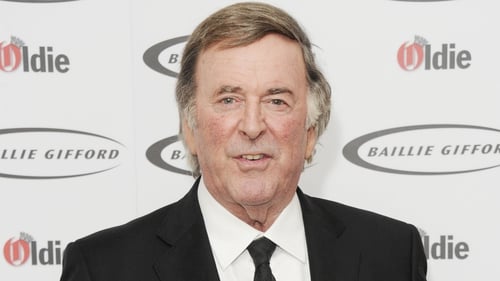 Terry Wogan - his fictional character Tom is a Bank Manager