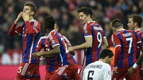 Bayern Munich's midfielder Thomas Mueller blows a kiss to the fans after he scored his second and Bayern's fourth goal