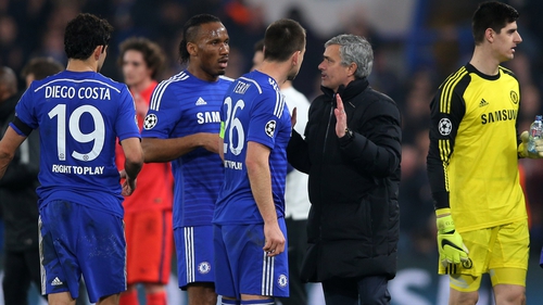 Jose Mourinho talks to his players ahead of extra time
