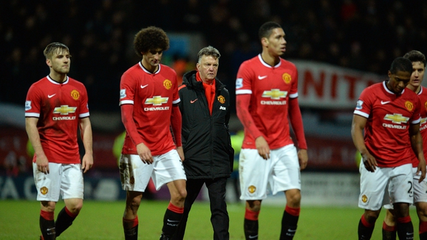 Louis van Gaal (C) said he had faith that he would finish his three years with Manchester United