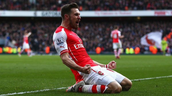Aaron Ramsey celebrates scoring Arsenal's second goal against West Ham