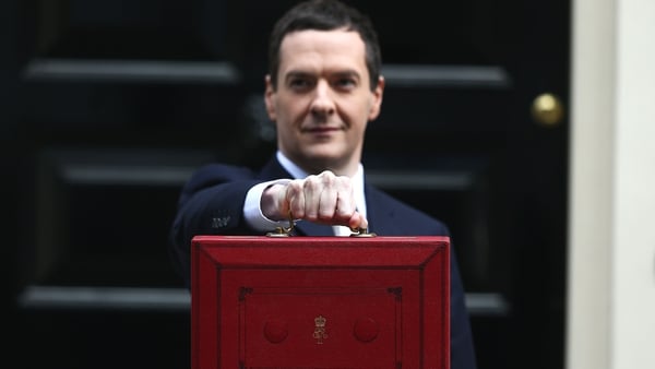 UK finance minister George Osborne raises economic growth figures