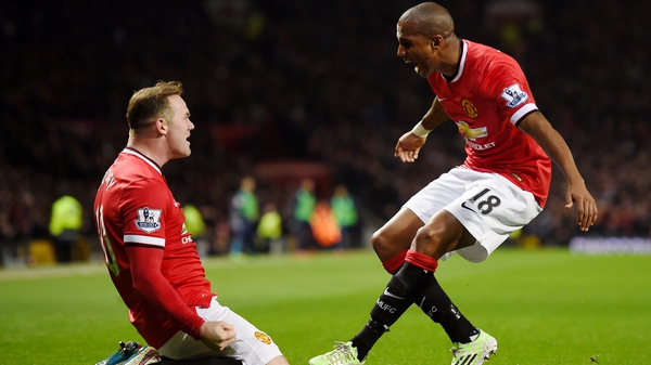 Ashley Young (R) with Manchester United team-mate Wayne Rooney