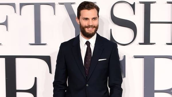 Living with Jamie Dornan was like 'living with a puppy' for Eddie Redmayne