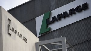 Lafarge and Holcim are selling assets to win regulatory approval for their planned merger