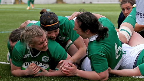 Ireland's Claire Molloy celebrates her try with Paula Fitzpatrick