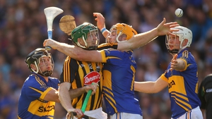 Under pressure from Padraic Maher of Tipperary during the 2011 All-Ireland SHC final