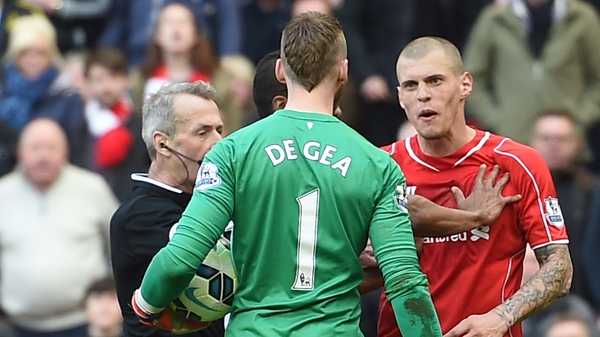 Martin Skrtel is charged with stamping on David de Gea