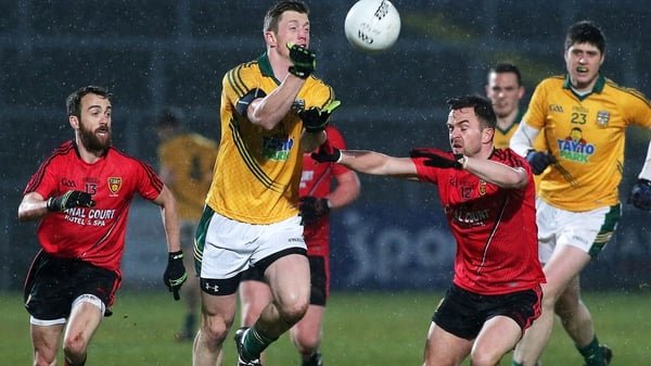 Meath saw off Down's challenge to stay in the hunt for promotion