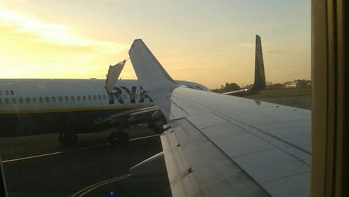 This image, taken by a passenger on board one of the planes involved, shows the moment of contact on 1 April