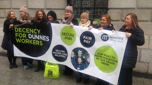 Dunnes stores workers and former workers outside the GPO in Dublin