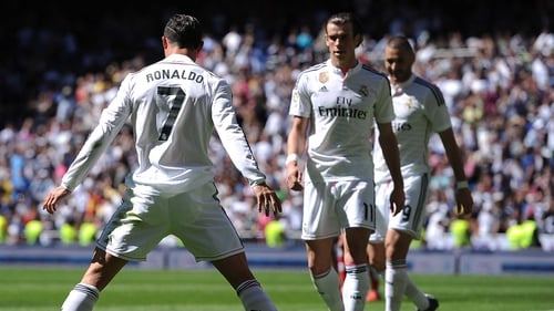 Ronaldo poses after scoring Real's fourth goal at the Bernabeu