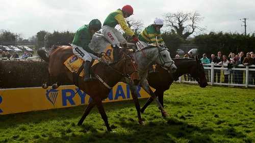 Tony McCoy on Gilgamboa (R) made winning move with huge leap at last fence