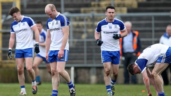 Monaghan players show their dejection after losing to Dublin