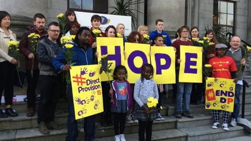 A protest at the Department of Justice to mark 15 years of direct provision