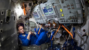 A NASA astronaut is seen inside a Soyuz simulator at the Gagarin Cosmonaut Training Centre in Star City, Russia