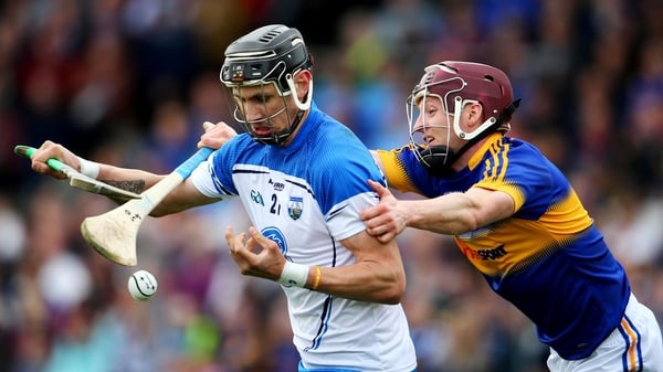 Tipperary's Paddy Stapleton tackle's Maurice Shanahan of Waterford