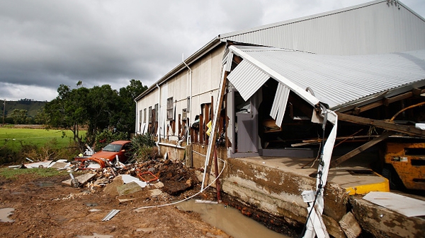 The storm destroyed houses, cut power and caused millions of dollars of damage