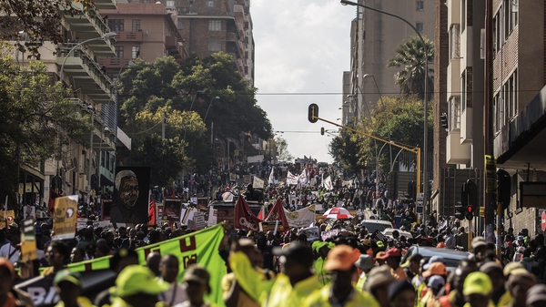 Thousands march against xenophobic violence through the streets of Johannesburg on 23 April